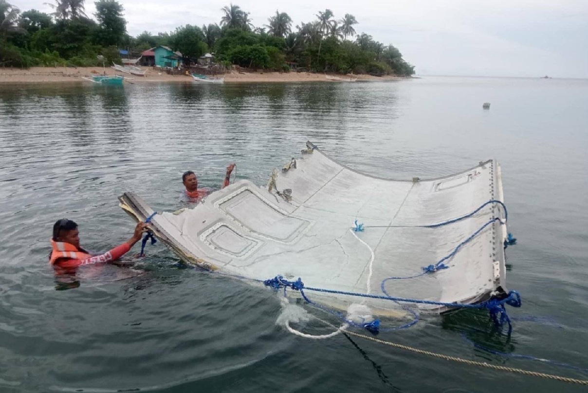 Photos show Chinese rocket debris washed up on shoreline