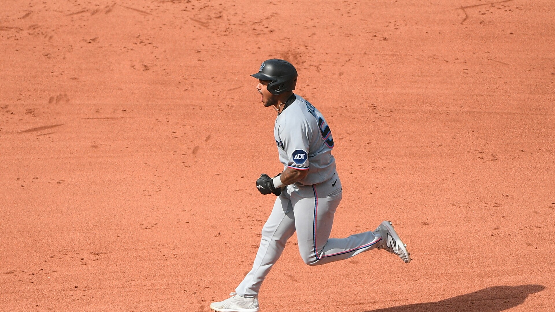 Marlins’ Dane Myers gets heckled by fan at Fenway Park. He hits tying