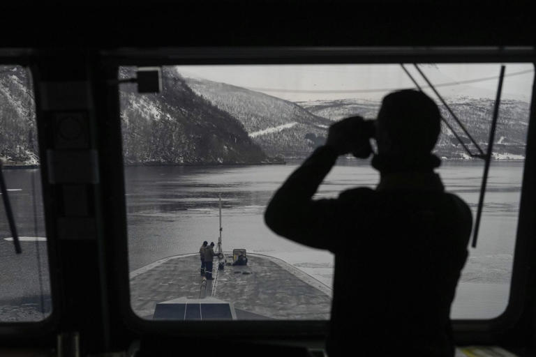 A French frigate during NATO exercises in a Norwegian fjord.