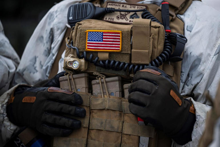 U.S. Marines are taught how to camp in the snow and hide without the cover of trees.