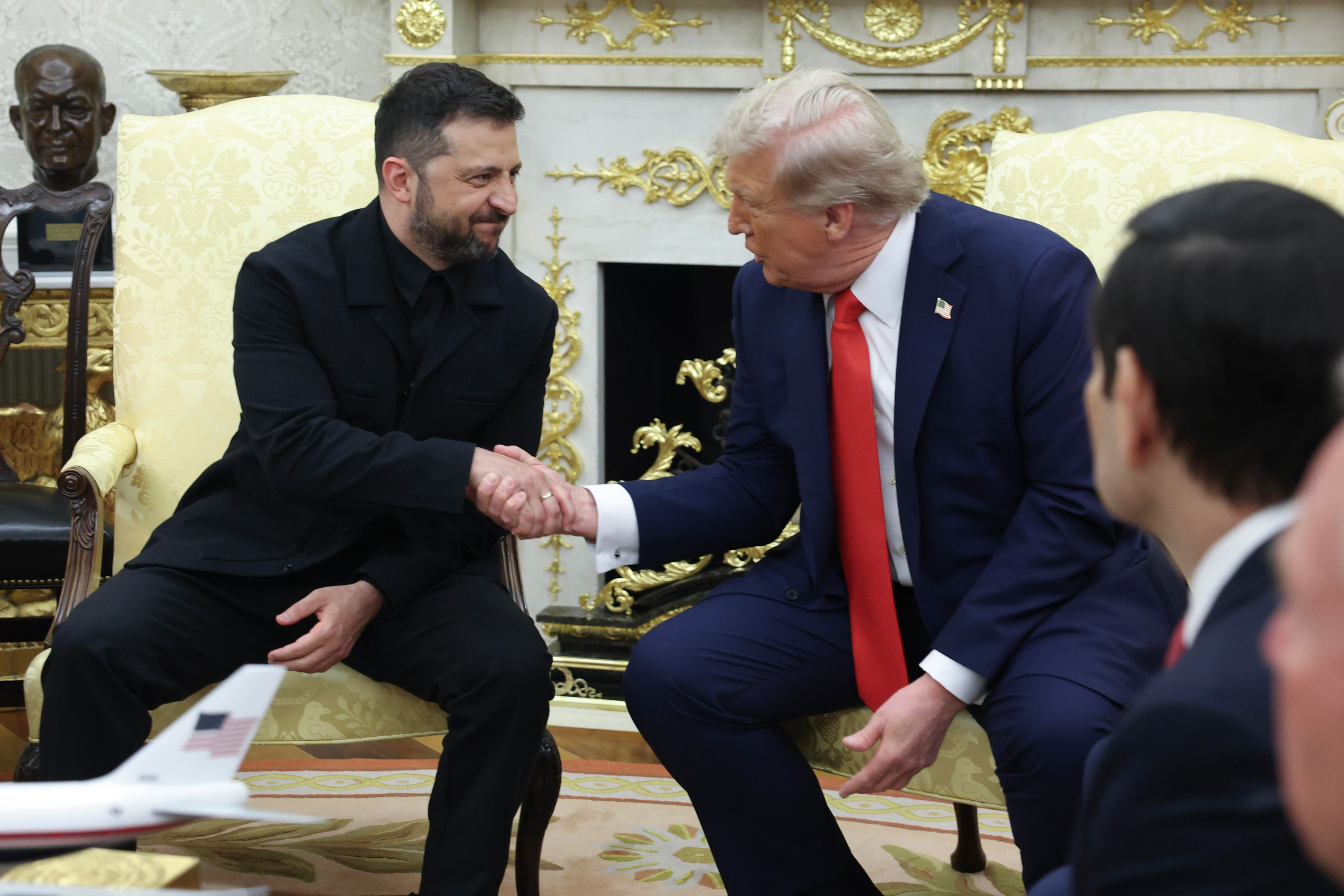 President Trump shakes hands with Ukrainian President Volodymyr Zelenskyy during a meeting in the Oval Office at the White House on Aug. 18, 2025, in Washington, D.C. / Credit: Anna Moneymaker / Getty Images
