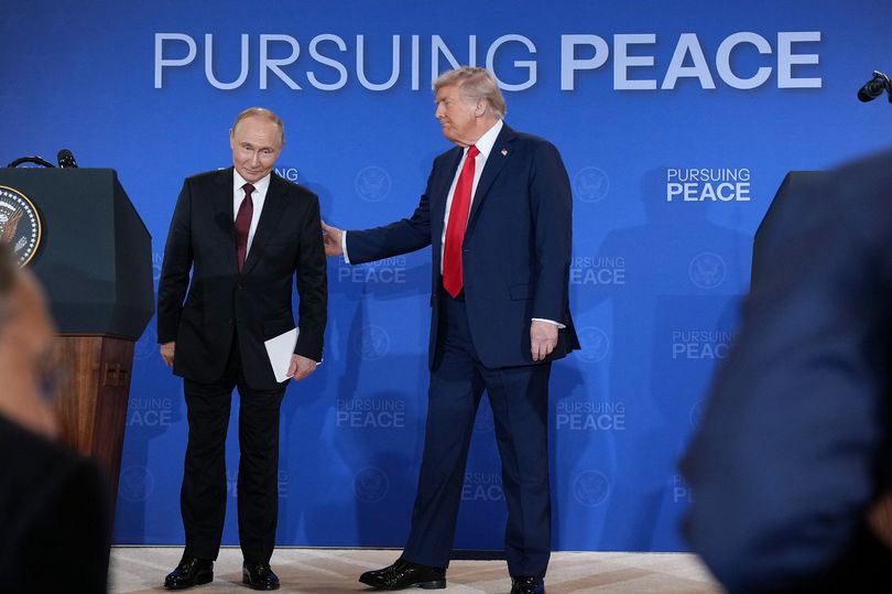 U.S. President Donald Trump (R) and Russian President Vladimir Putin leave following a press conference at Joint Base Elmendorf-Richardson on August 15, 2025 in Anchorage, Alaska.