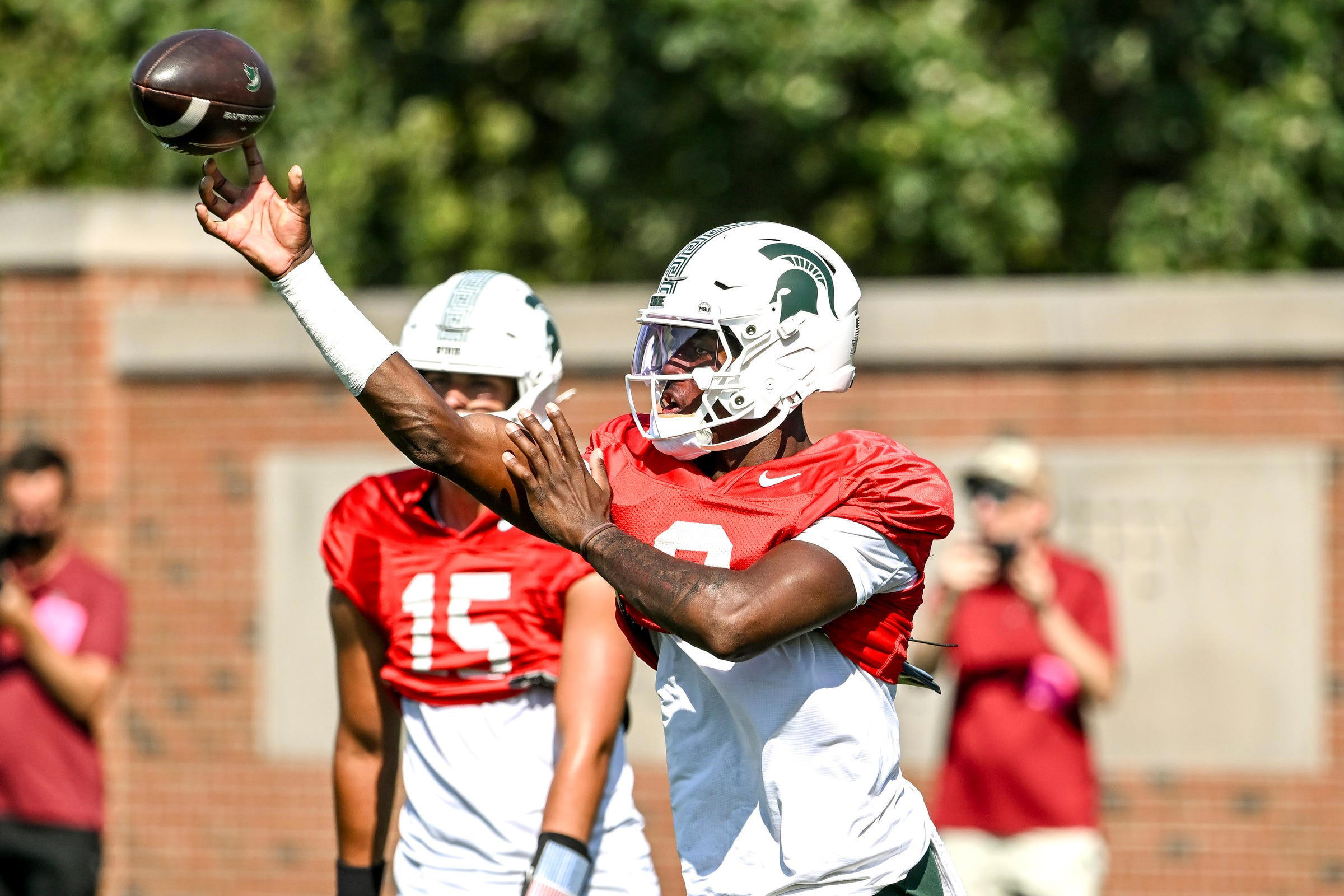 MSU WR coach Courtney Hawkins has high praise for Spartans quarterback MSU WR coach Courtney Hawkins has high praise for Spartans quarterback