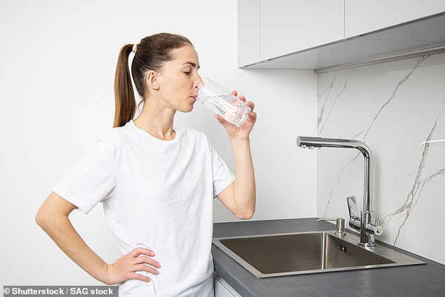 Water is widely considered the healthiest liquid for the human body. But one health gym-goer revealed she was drinking so much it nearly killed her (stock image)