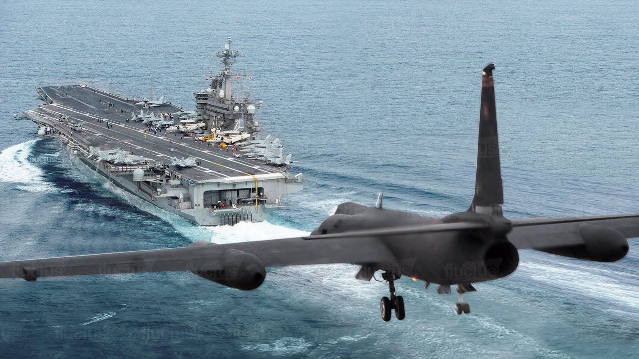 Gigantic US Spy Plane Lands on a US Aircraft Carrier<br>