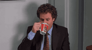 Buddy trying coffee and looking disgusted in Elf