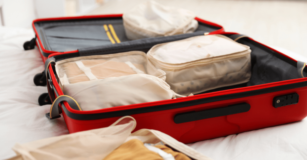Open suitcase with packing cubes
