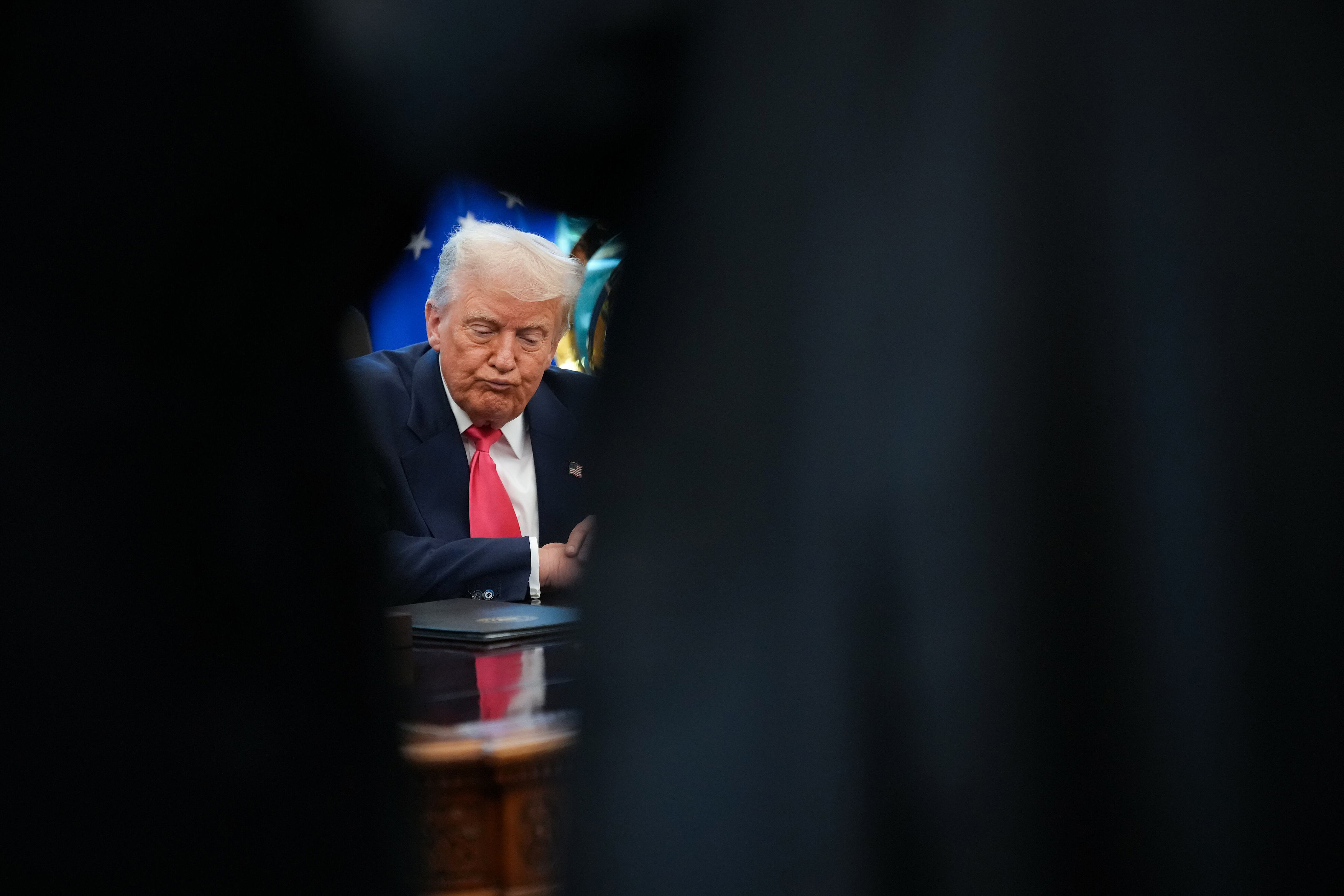 President Donald Trump answers questions from reporters in the Oval Office on August 14, 2025 in Washington, D.C. / Andrew Harnik / Getty Images