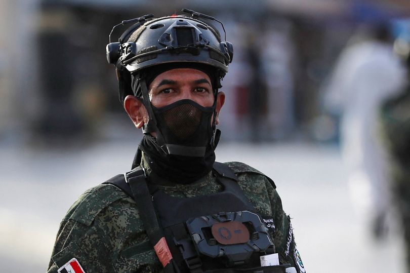 Anti-Narco Special Forces man stands guard in Tahrir Square, Baghdad