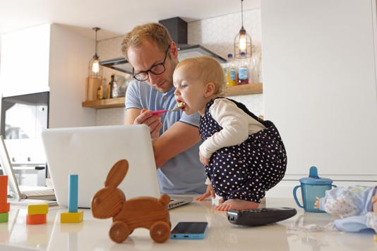 Father feeding child