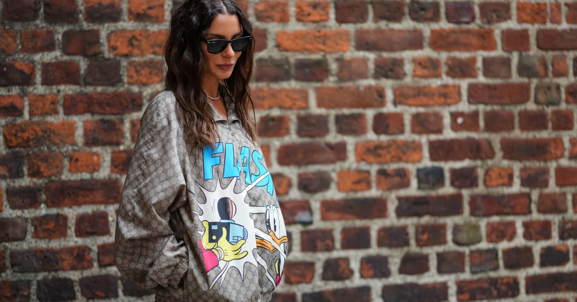 A model wears a loose-fitting jacket from the Gucci x Donald Duck collection on August 04, 2025 in Copenhagen, Denmark.