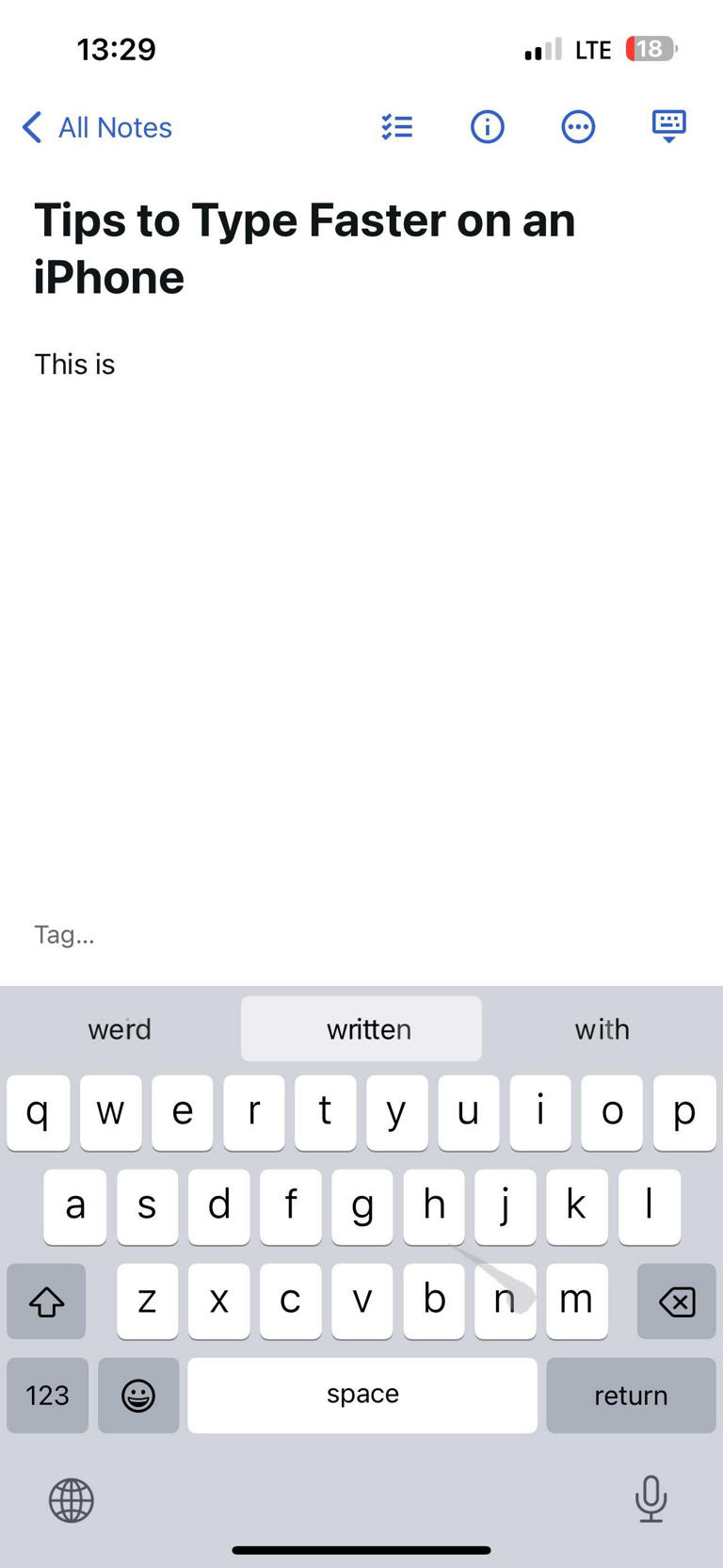 Swiping a finger across letters on an iPhone keyboard to type a word.