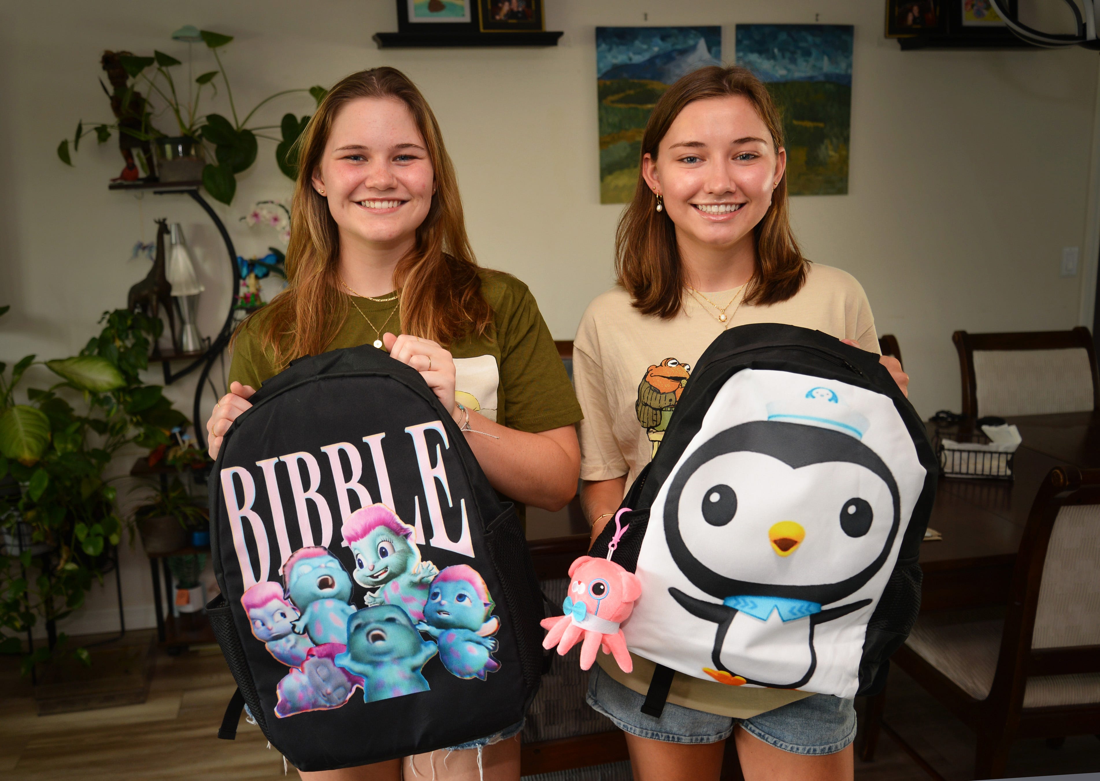 Why are high school seniors wearing backpacks with Elmo, Disney ...