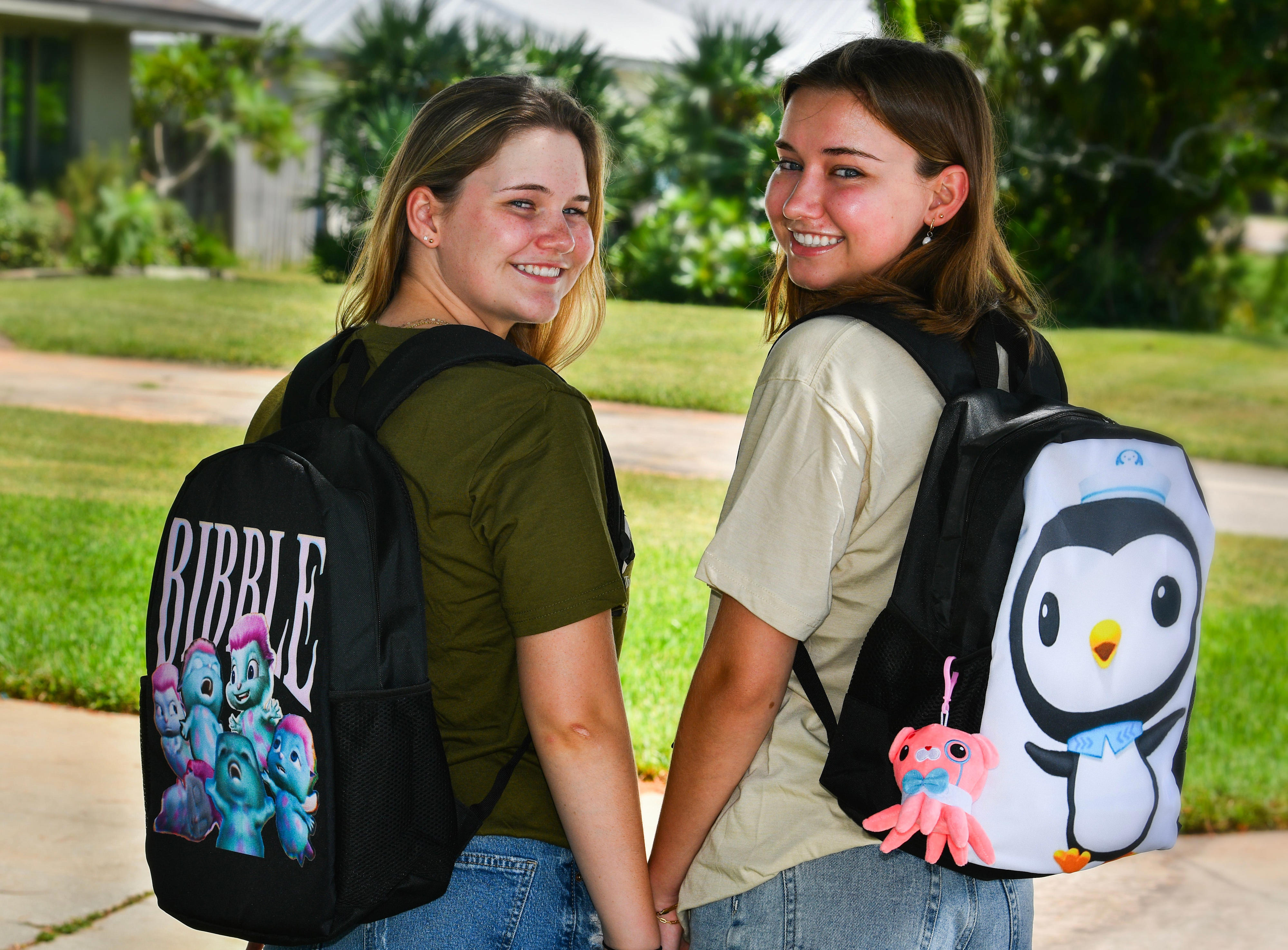Why are high school seniors wearing backpacks with Elmo, Disney ...