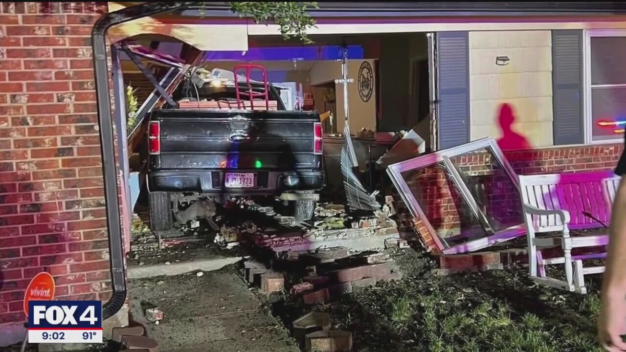 DWI suspect with prior charge crashes truck into home