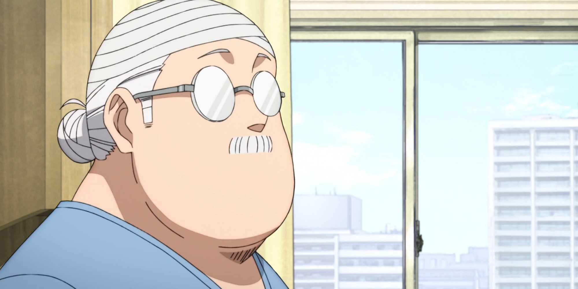Sakamoto is sitting inside a hospital room with a bandage over his head in Sakamoto Days.