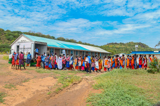 Villagers queue for food at a pop-up run by Food Banking Kenya (Food Banking Kenya)