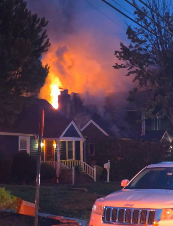Firefighters rescue woman from burning home in Arlington