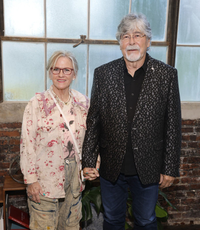 Member of Iconic Country Band Cleans Up for Rare Red Carpet Appearance with  Wife