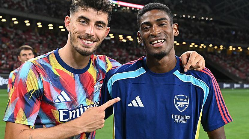 Cristhian Mosquera, shown here with Gunners forward Kai Havertz on the club's pre-season tour, is right-footed but is able to play as a right or left-sided centre-half