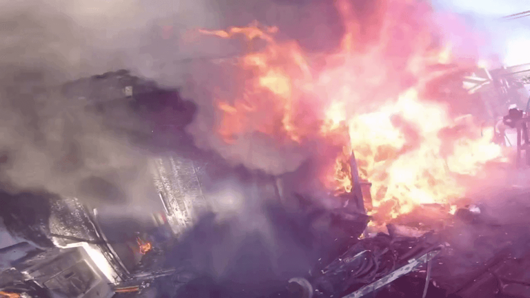 HELMET CAM: Firefighters go into rescue mode during accidental house fire