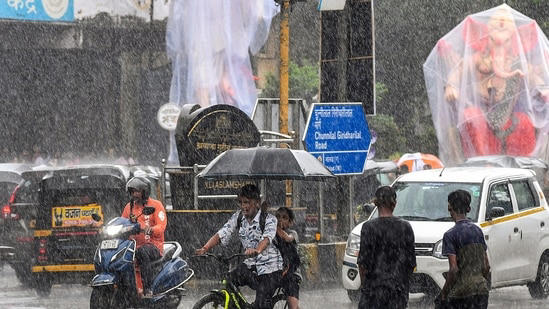 Mumbai, Delhi hit by heavy rain, waterlogging and traffic jams disrupt life  | Photos