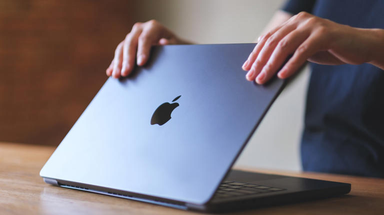 MacBook with lid open but screen asleep