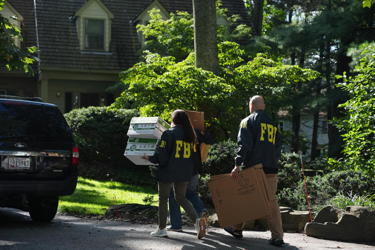 FBI agents exit John Bolton's office with boxes in raid: Live updates