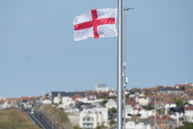 Residents say they feel 'threatened and abused' as flags line seafront road