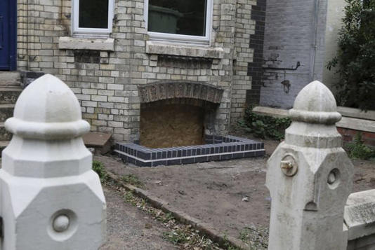 Police called after builders discover bones in cellar on sleepy terraced street