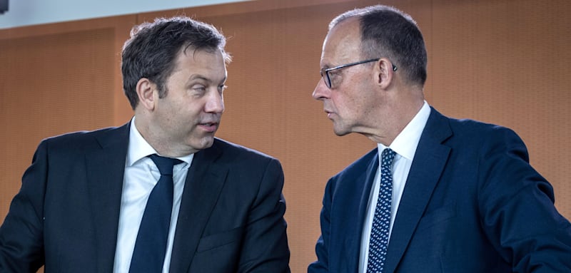 BERLIN, GERMANY - MAY 14: Chancellor Friedrich Merz (R) and Finance Minister Lars Klingbeil attend the second cabinet meeting of the new federal government on May 14, 2025 in Berlin, Germany. The new government is a coalition of Christian Democrats (CDU/CSU) and Social Democrats (SPD). (Photo by Nadja Wohlleben/Getty Images)