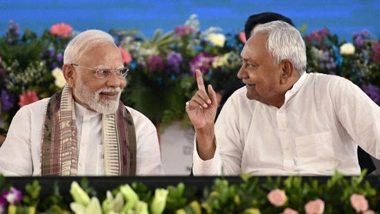 Prime Minister Narendra Modi with Nitish Kumar, Chief Minister of Bihar, during a public meeting in Gaya in Bihar on August 22.