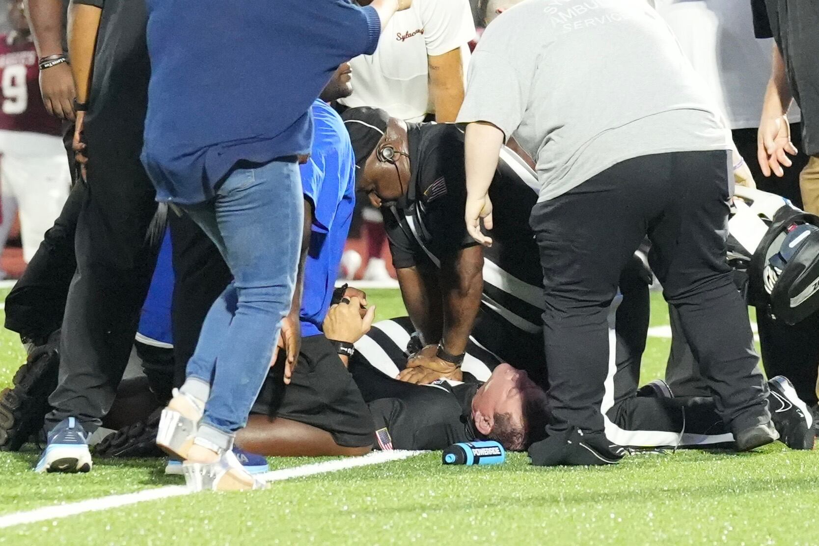 High school football referee hailed as hero after performing CPR on ...