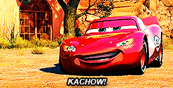 Animated red race car smiling with "KACHOW!" text below