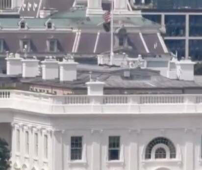 White House explains mysterious figure seen throwing items from window