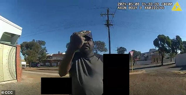 Shock moment Aboriginal man is tasered and shoved to the ground after