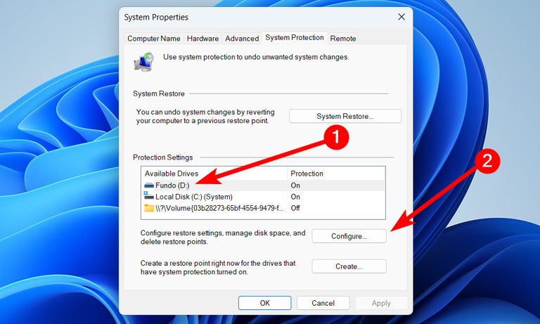Selecting a drive to configure System Restore on in Windows.