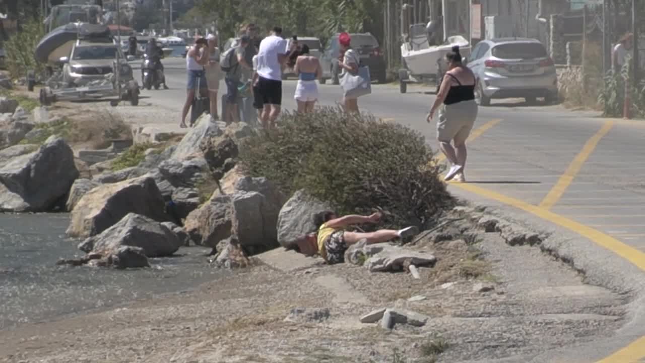 Tourist thrown against rocks as she's hit by jet blast from plane at ...