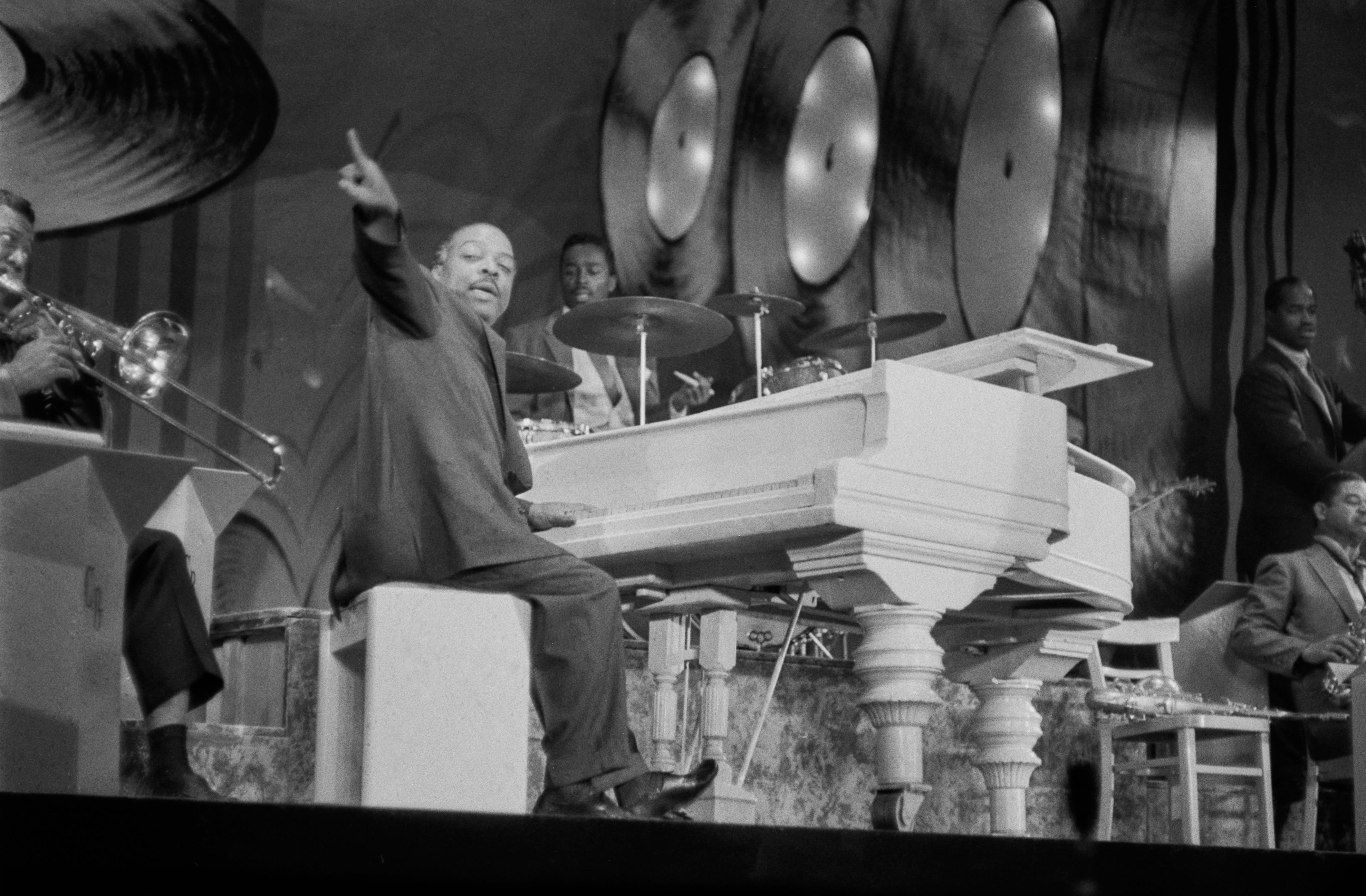 Count Basie performs during a Royal Variety performance on Nov. 18, 1957, at the London Palladium.
