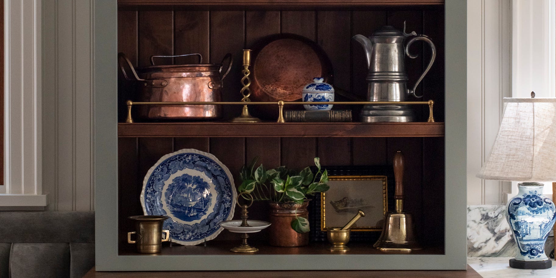Why Designers Are So Obsessed With Shelf Railings