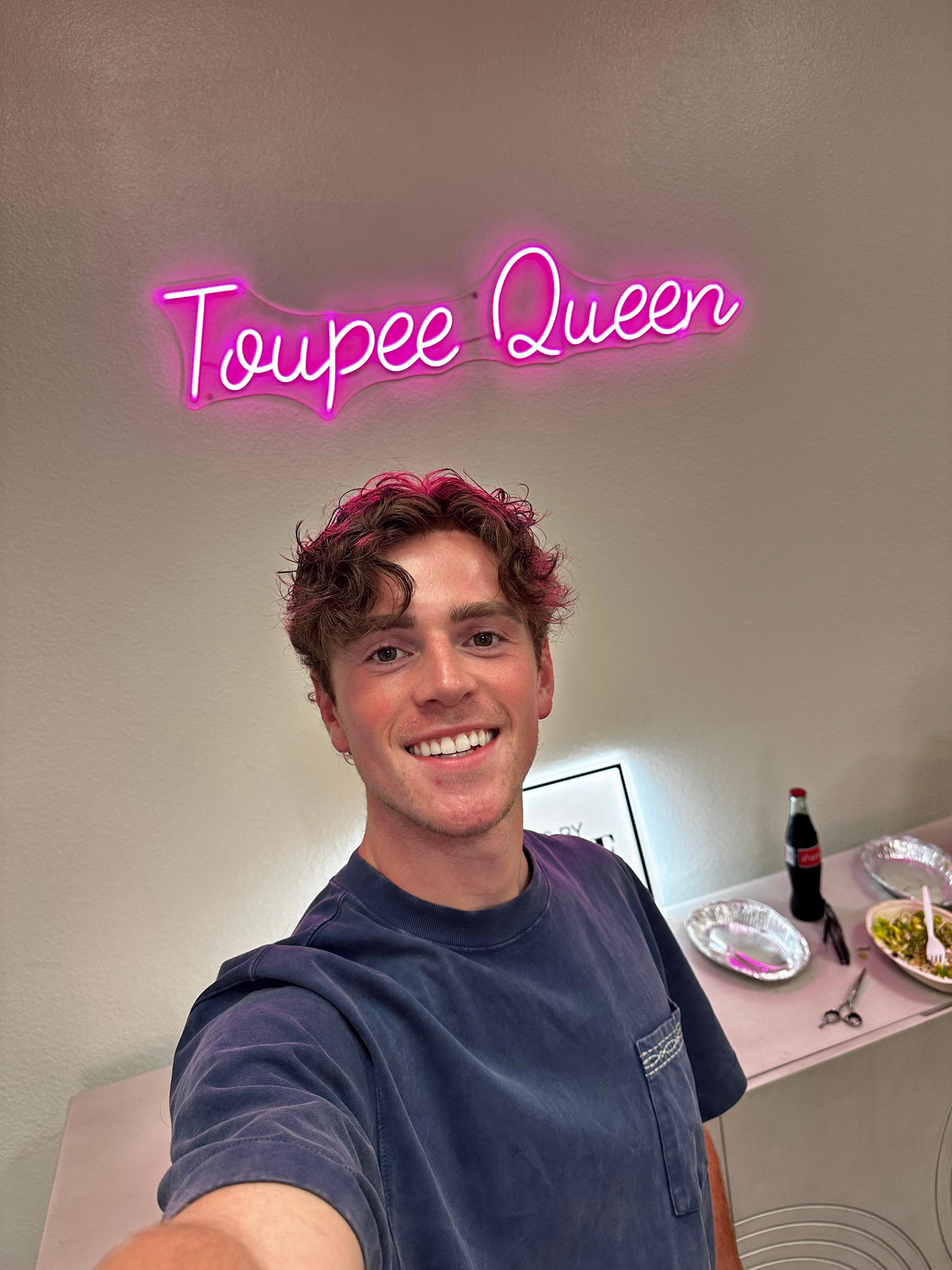 He started going bald at 18. His shocking wig video went viral — and is