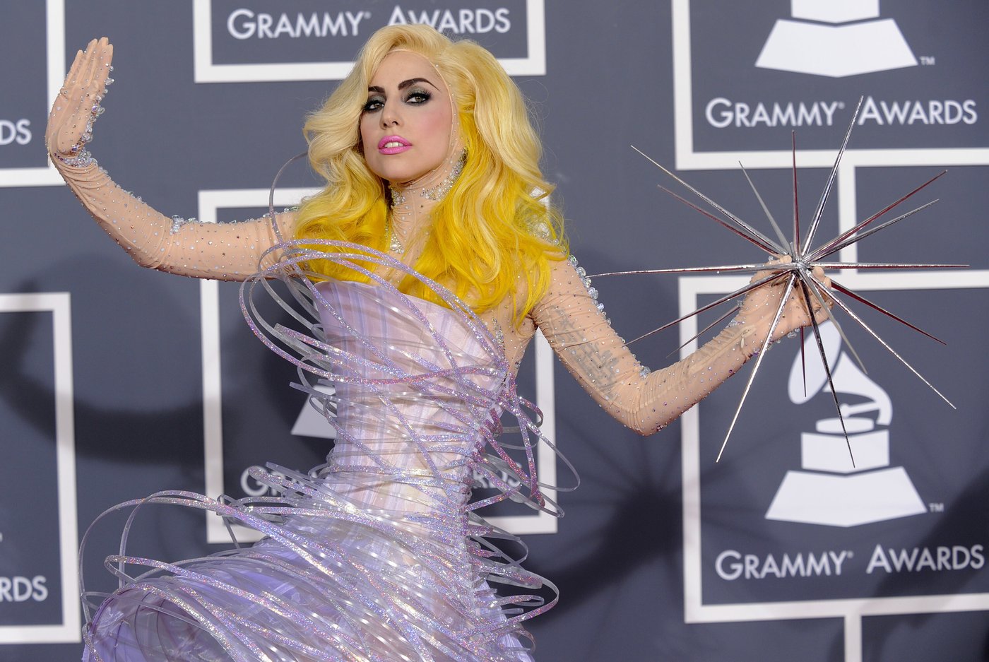 FILE - This Jan. 31, 2010 file photo shows Lady Gaga arriving at the Grammy Awards in Los Angeles wearing a futuristic lavender dress by Armani Prive. (AP Photo/Chris Pizzello, file)