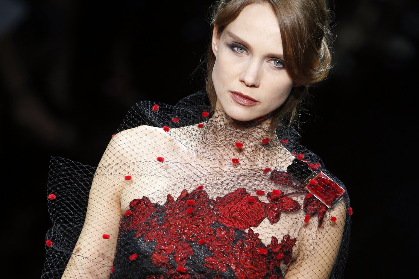 FILE - A model wears a creation as part of the Giorgio Armani Prive Fall Winter 2014-15 Haute Couture fashion collection, presented in Paris, July 8, 2014. (AP Photo/Francois Mori, file)