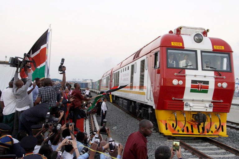 The SGR cargo train rides from the port containers depot on a Chinese-backed railway costing nearly US$3.3 billion, opened by Kenya's president as one of the country's largest infrastructure project since independence. Photo: AP