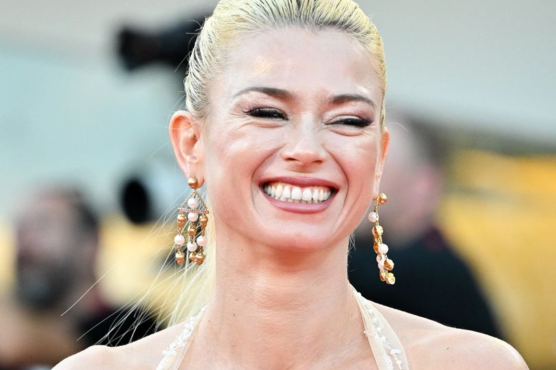 Lingerie model tennis star makes shock return home after 'fleeing for