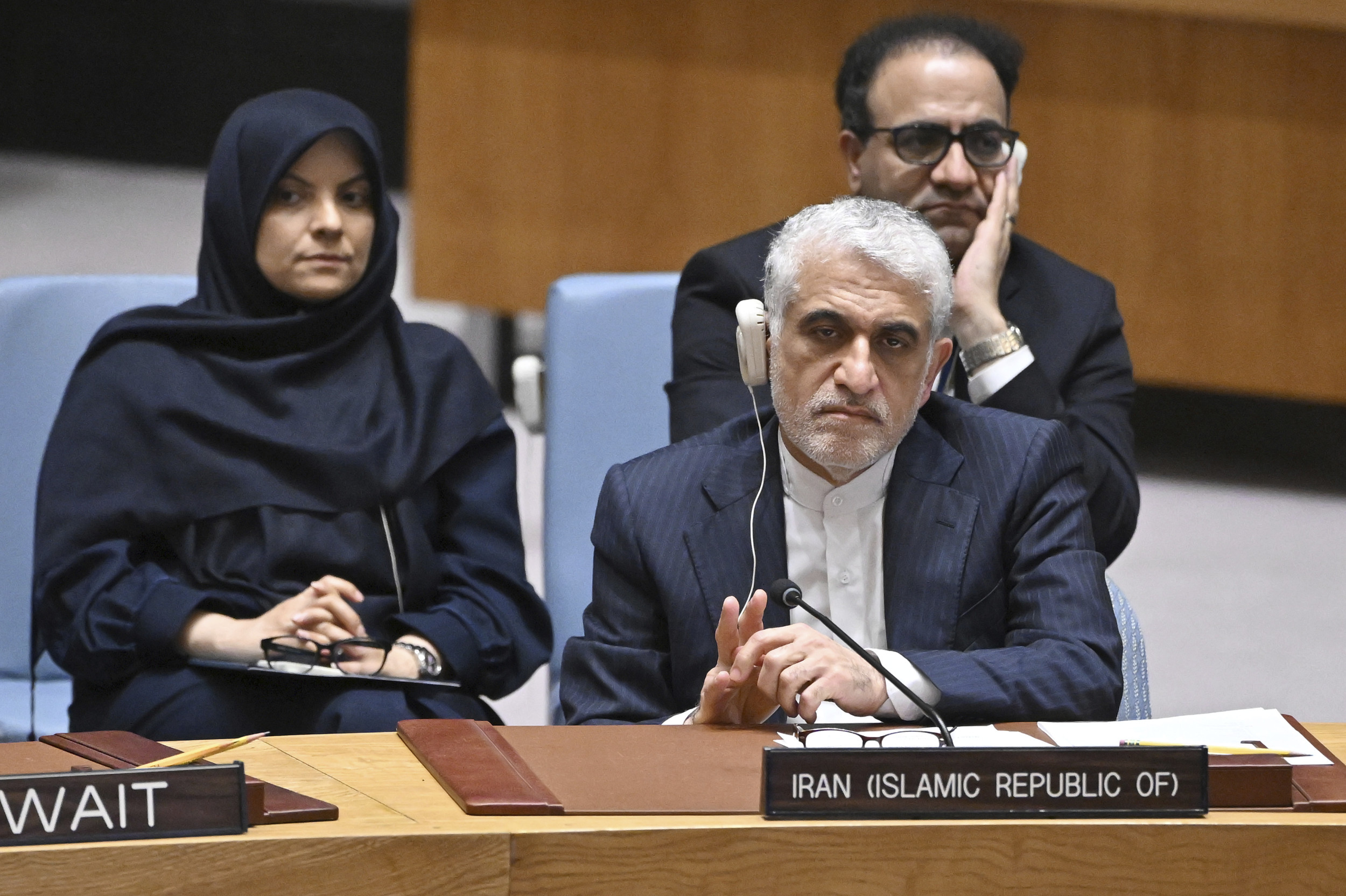 Ambassador Amir Saeid Iravani, Permanent Representative of Iran to the UN, (r) waits to speak at a United Nations Security Council meeting on threats to international peace and security at the United Nations headquarters, New York, June 22, 2025. The meeting comes one day after U.S. President Donald Trump announcement that the U.S. had bombed three nuclear sites in Iran. Anthony Behar/AP Photo