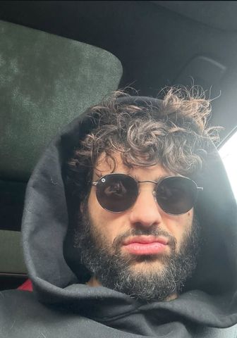 Noah Centineo Reveals Bold Shoulder-Length Blonde Curls in a Shirtless