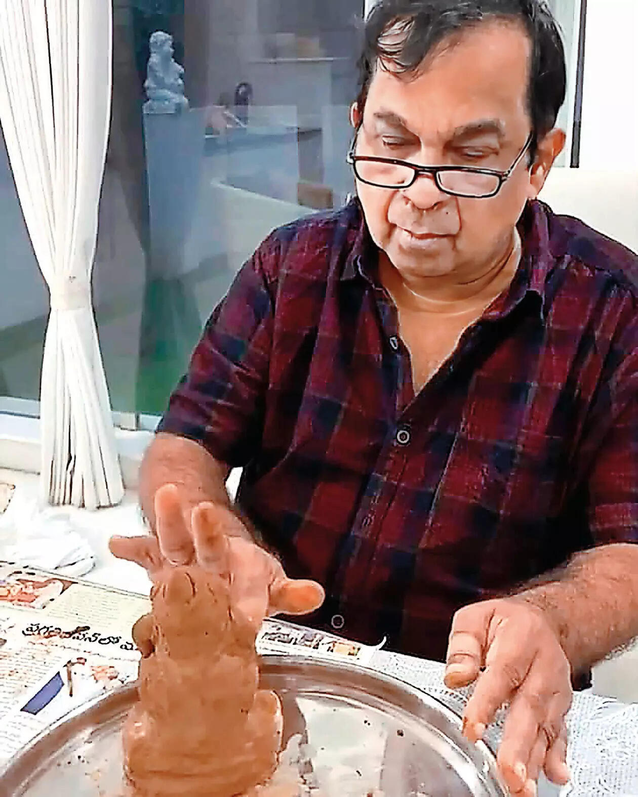 Sculpting a clay Vinayaka with my hands is my way of connecting with him: Brahmanandam