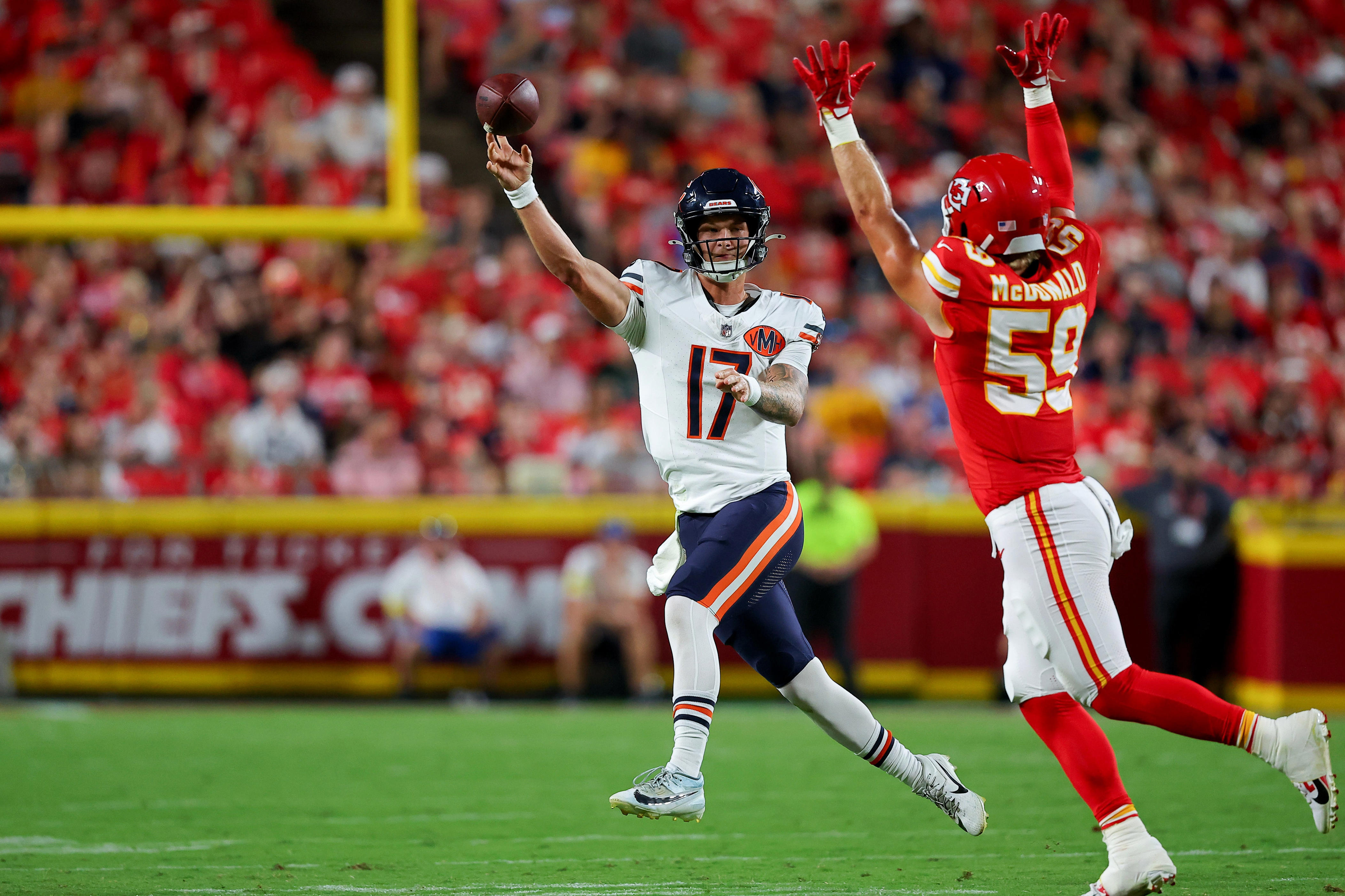 KANSAS CITY, MISSOURI - AUGUST 22: Tyson Bagent #17 of the Chicago Bears throws a third quarter pass over Cooper McDonald #59 of the Kansas City Chiefs during the NFL Preseason 2025 game between Chicago Bears and Kansas City Chiefs at Arrowhead Stadium on August 22, 2025 in Kansas City, Missouri. (Photo by David Eulitt/Getty Images)