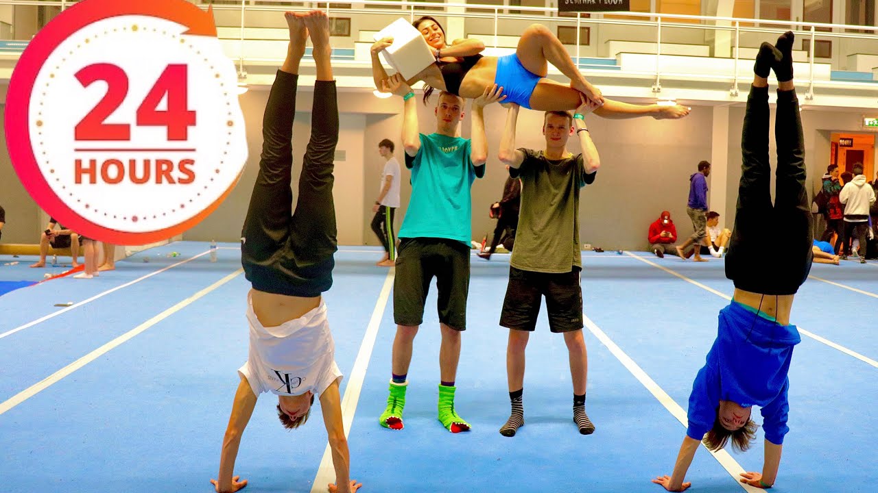 Athletes spend full night practicing inside large gymnastics gym